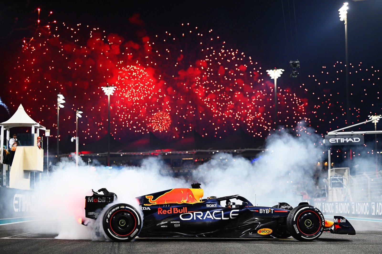 ABU DHABI, UNITED ARAB EMIRATES - NOVEMBER 26: Race winner Max Verstappen of the Netherlands driving the (1) Oracle Red Bull Racing RB19 performs donuts on track during the F1 Grand Prix of Abu Dhabi at Yas Marina Circuit on November 26, 2023 in Abu Dhabi, United Arab Emirates. (Photo by Clive Mason - Formula 1/Formula 1 via Getty Images)